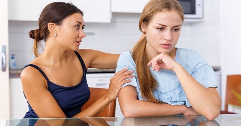 woman trying to be helpful to her friend