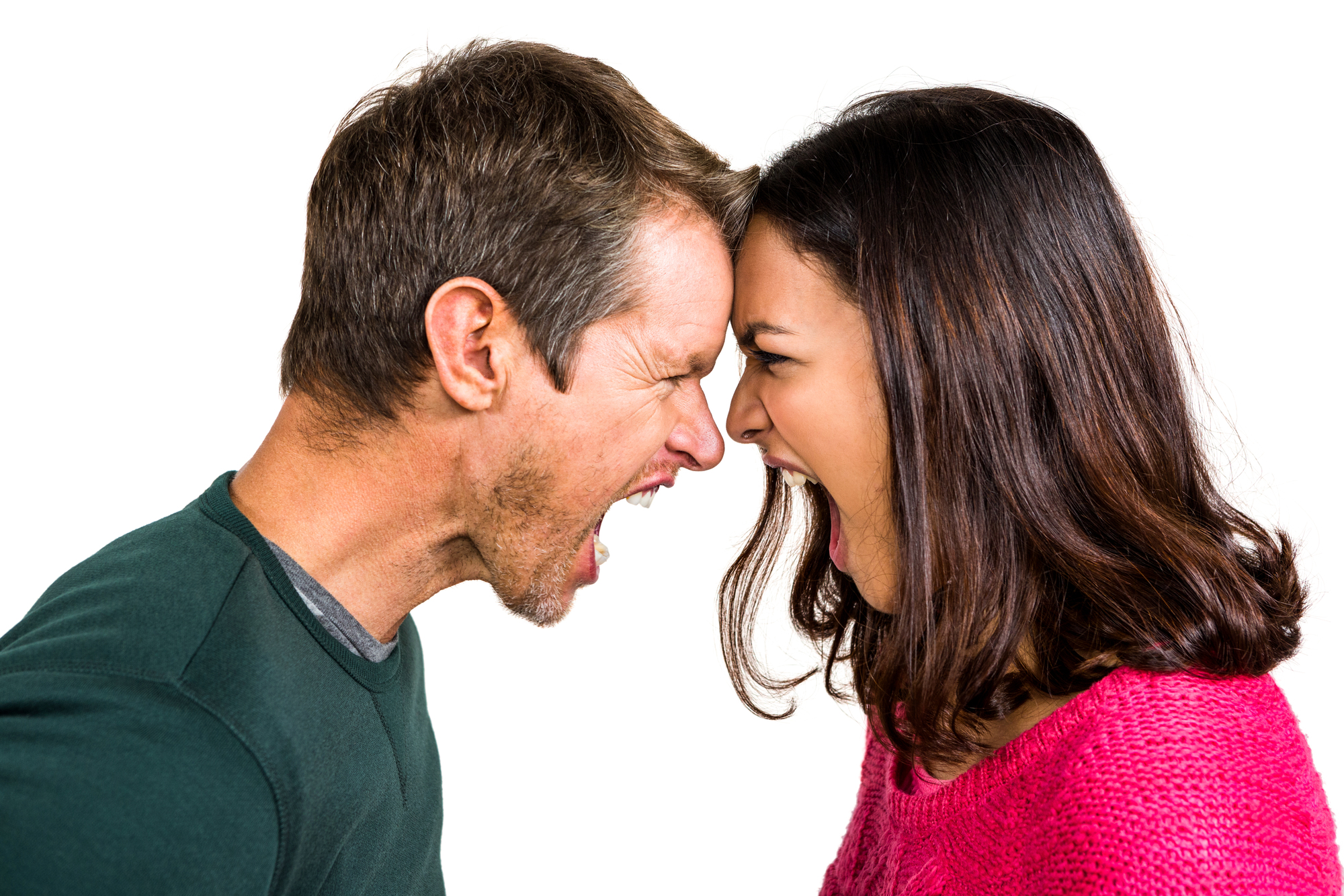 A man and a woman are facing each other with their foreheads touching, both yelling aggressively. The man is wearing a dark green shirt, and the woman is wearing a bright pink sweater. The background is plain white.