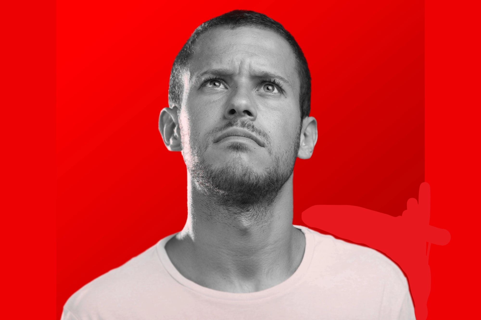 A man with a contemplative expression looks upward against a vibrant red background. He is wearing a light-colored shirt and appears to be deep in thought.